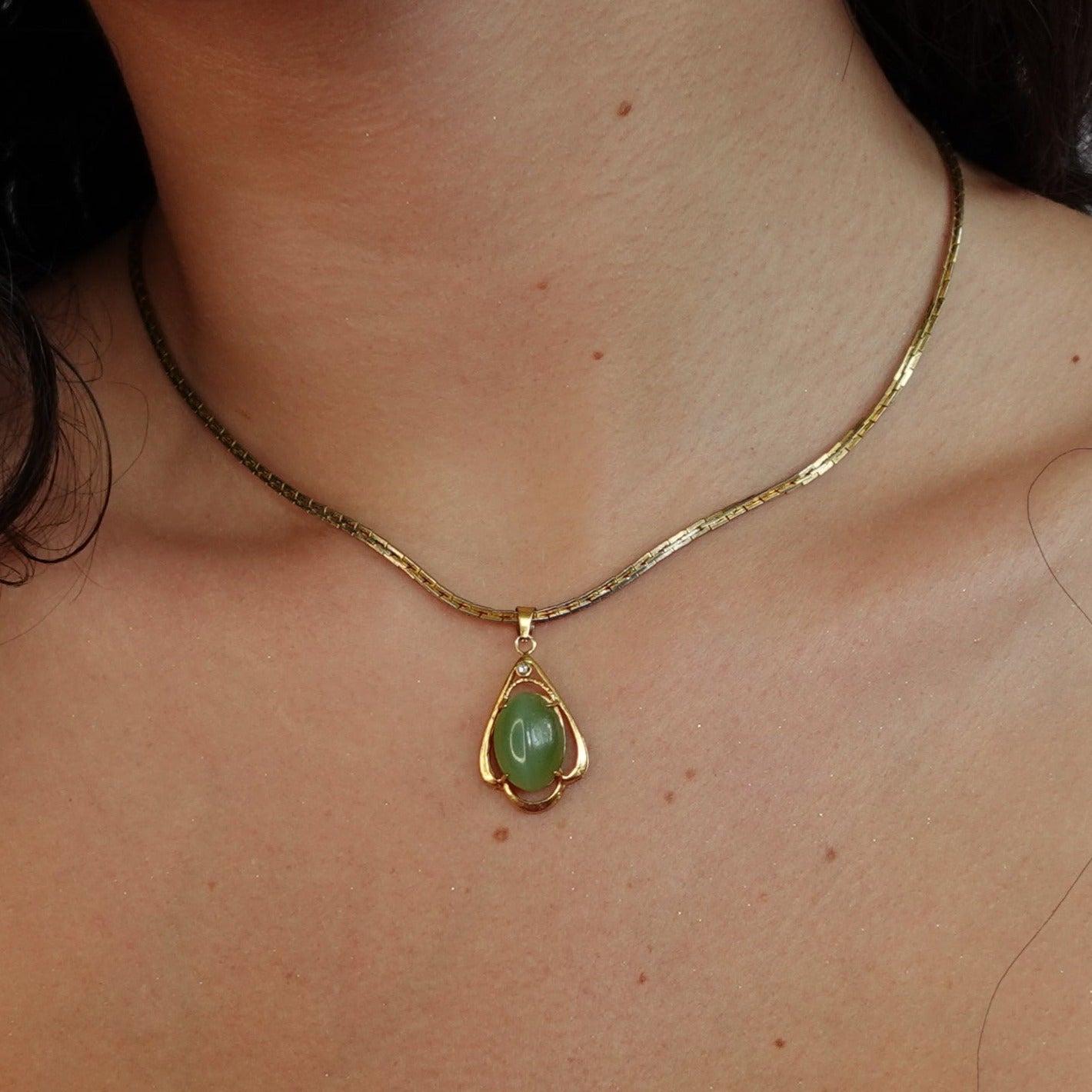 Gold Tone Emerald Esc. Necklace